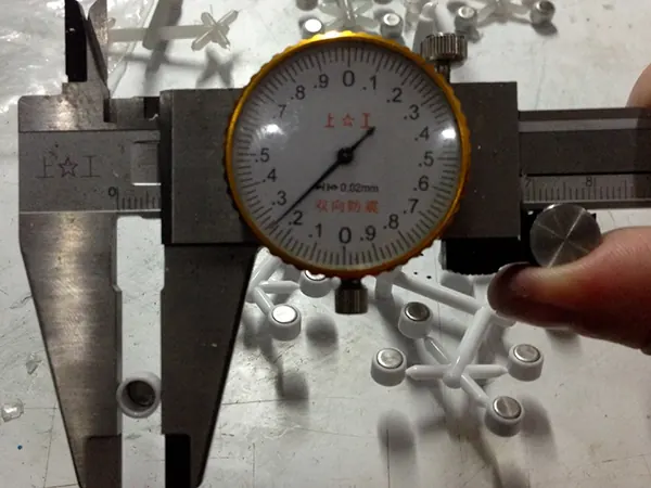 Molding & stamping: Overmolded battery enclosure